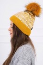 Auksinės spalvos moteriška kepurė